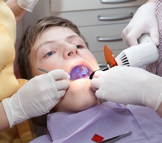little boy getting dental sealants in Brownstown